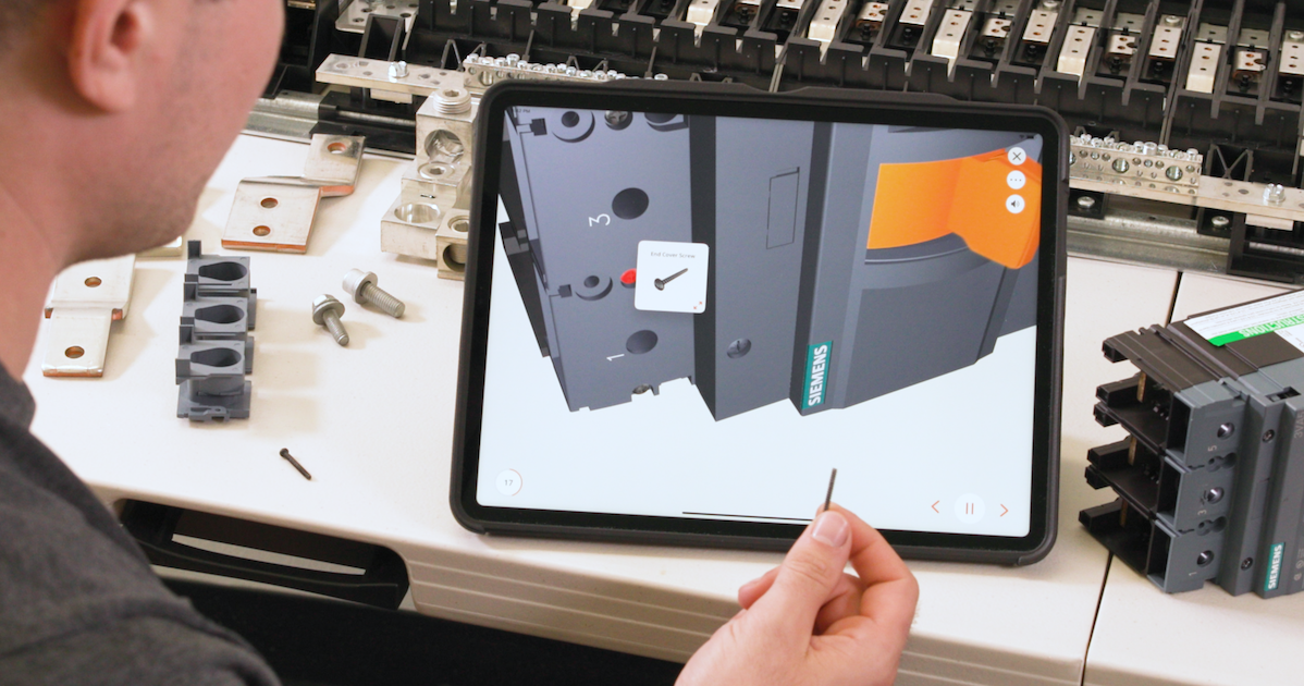 young man uses work instruction software for manufacturing